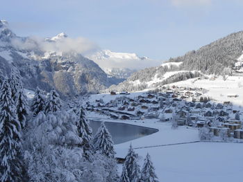 Scenic view of snowcapped mountains against sky