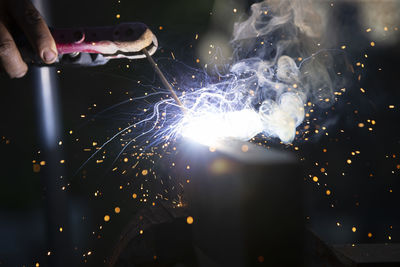 Person holding firework display