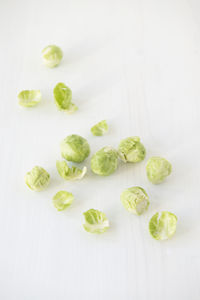 High angle view of candies over white background