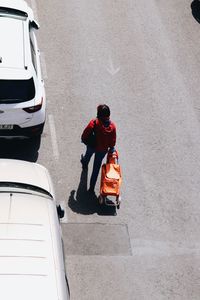 High angle view of people on street in city