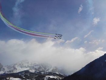 Low angle view of airplane flying against sky frecce tricolori