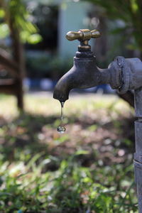 Close-up of water faucet