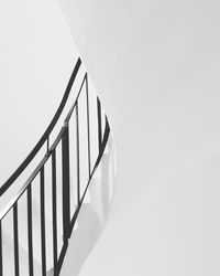 Low angle view of spiral stairs against sky