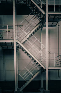 Staircase in old factory building, retro toned image.