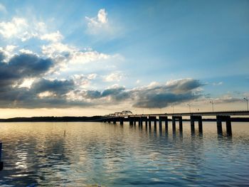 Bridge over river against sky