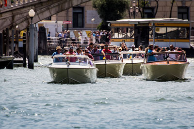 People in boat on water