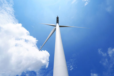 Low angle view of wind turbine against sky