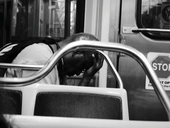 Close-up of man driving car