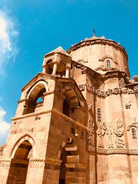 Low angle view of historical building against blue sky