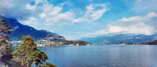 Scenic view of mountains against cloudy sky