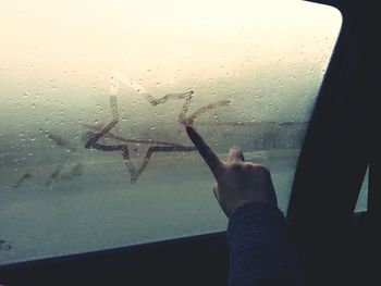 Reflection of people on glass window