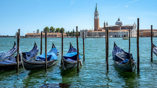 View of boats moored in canal