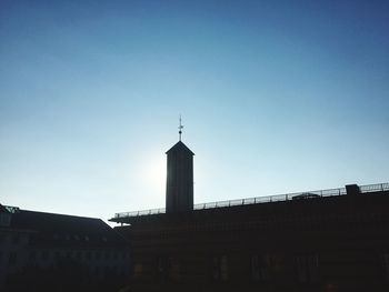 Low angle view of tower against clear blue sky