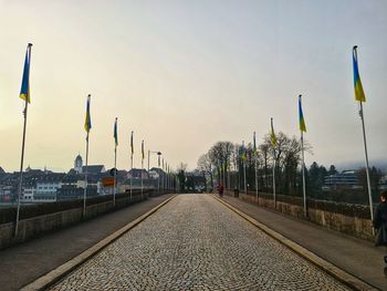 Railroad track against clear sky