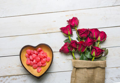 High angle view of pink roses on table