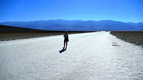 Scenic view of tourist at salt flats