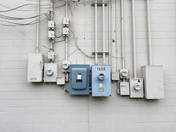 Electricity boxes on the wall