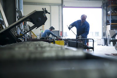 Metal construction, metal worker grading steel