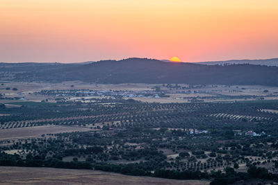 High angle view of landscape against sky during sunset