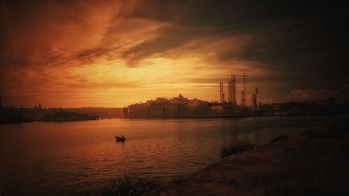 Scenic view of orange sky