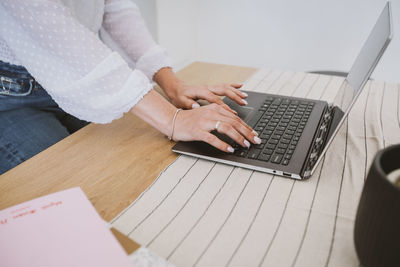 Business woman working with computer at the home office