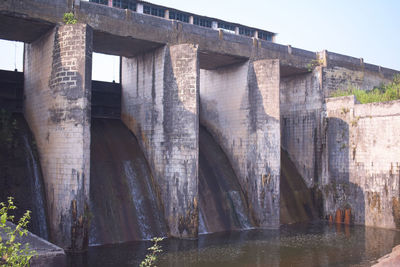 Low angle view of bridge over river