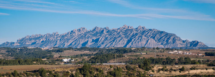 Panoramic view of landscape and mountains against sky