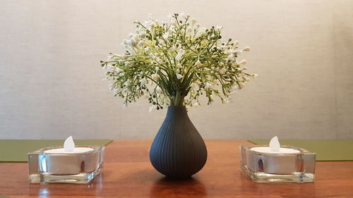 Close-up of vase on table at home