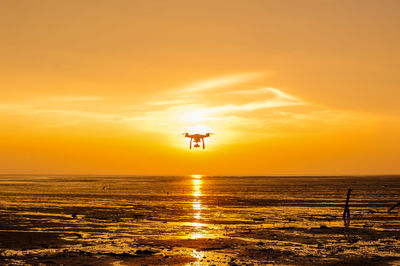 Scenic view of sunset over sea
