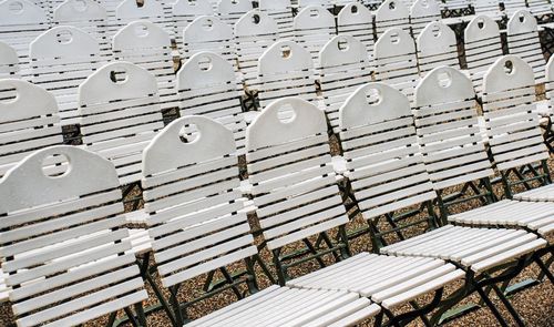 White empty chairs outdoors