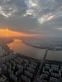 High angle view of cityscape against sky during sunset