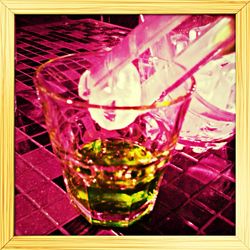 Close-up of beer glass on table