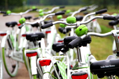 Close-up of bicycle in row