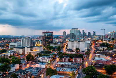 High angle view of illuminated buildings against sky