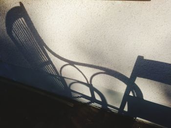 High angle view of shadow on wall