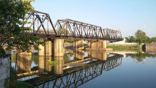 Bridge over river against clear sky
