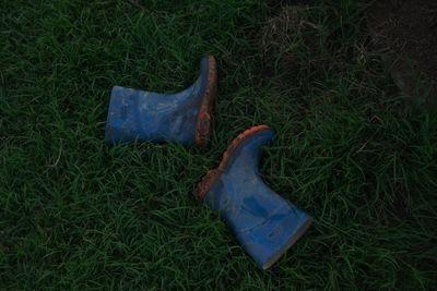 High angle view of shoes on field