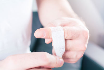 Close-up of person holding hands