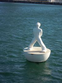 White sculpture on sea