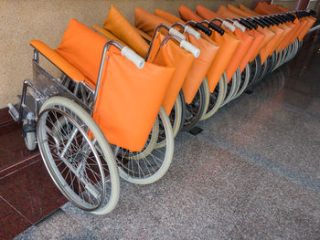 High angle view of yellow bicycle parked on road