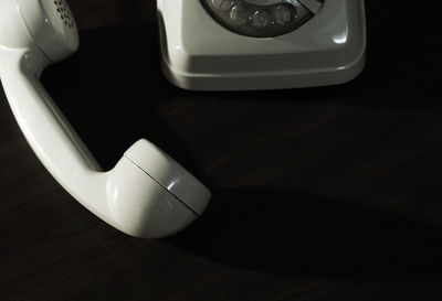 High angle view of mobile phone on table