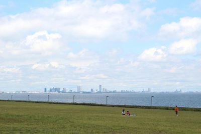 View of city against cloudy sky