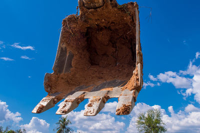 Clay at the bucket of tracked excavator