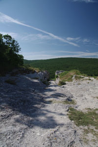 Scenic view of land against sky