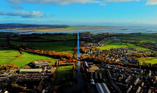 High angle view of buildings in city against sky