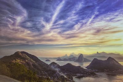 Scenic view of mountains against sky during sunset