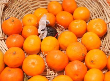 High angle view of oranges in basket