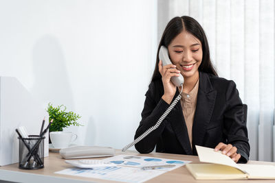 Businesswoman working at office