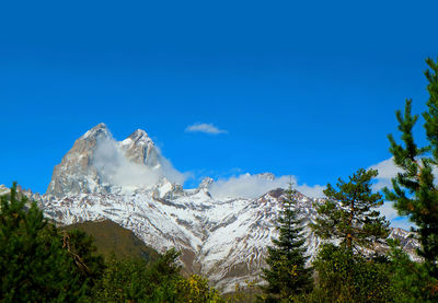 Amazing mount ushba with its double summit, greater caucasus range in svaneti region, georgia