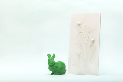 Botanical bas-relief wildflowers and poly low easter bunny for wall art. 3d flower plaster decor.